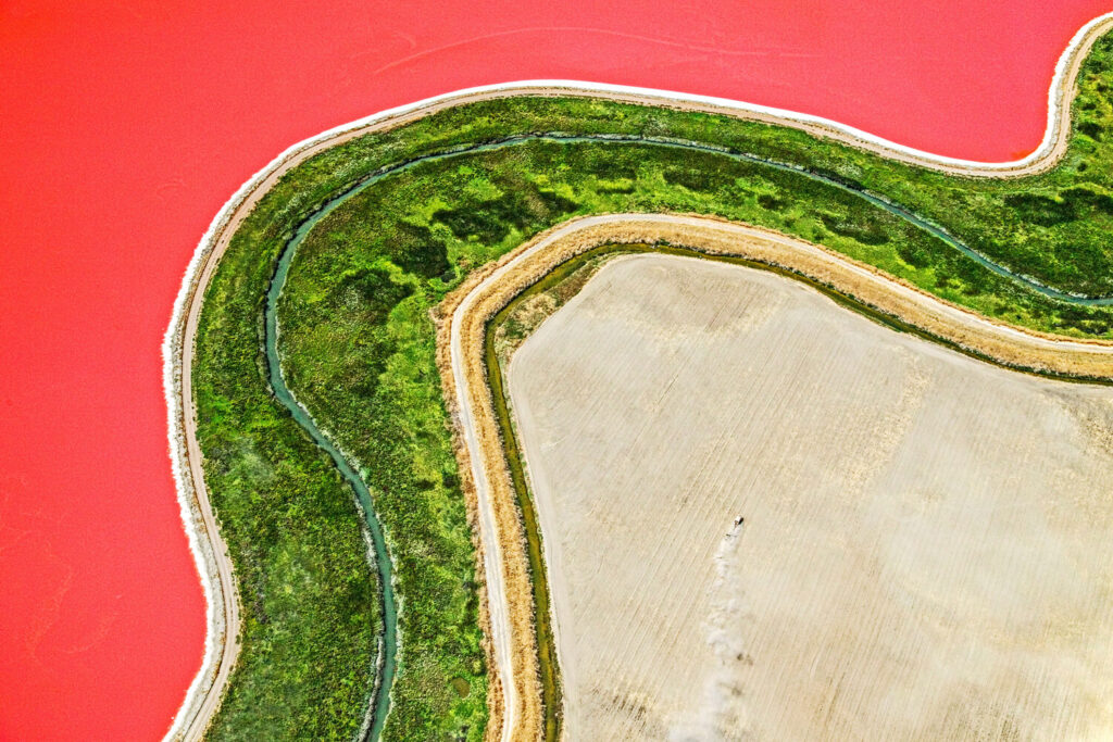 Pink Salt Pond with Winding Road